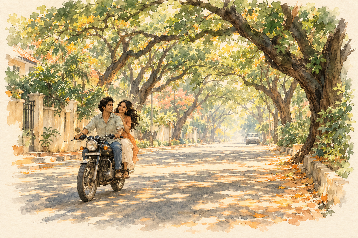 A young couple on an old motorbike under the rain trees of a green Bengaluru road